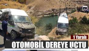 OTOMOBİL DEREYE UÇTU: 1 YARALI