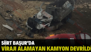 SİİRT BAŞUR’DA VİRAJI ALAMAYAN KAMYON DEVRİLDİ