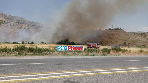 Siirt’in Baykan ilçesinde ekili arazide çıkan yangın, hasara yol açtı.