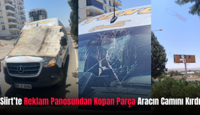 Siirt’te Reklam Panosundan Kopan Parça Aracın Camını Kırdı